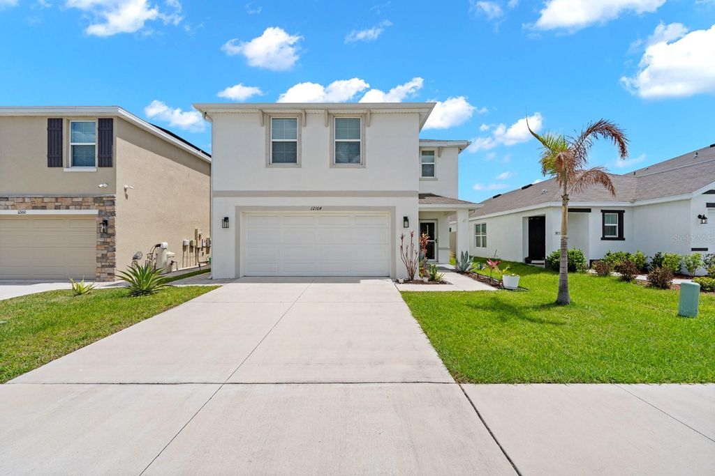 Photo of 12164 Lily Magnolia Lane, Riverview, FL 33569 (MLS # TB8493643)