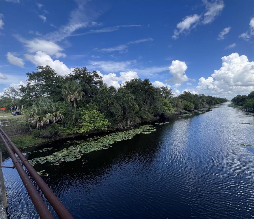 Imagine waking up to the tranquil beauty of your very own freshwater canal, where the gentle ripples reflect Florida’s golden sunshine. This exceptional vacant lot in North Port offers the perfect setting for your dream home, blending peaceful waterfront living with the convenience of an ideal location.

Situated in a fast-growing area, this property is just minutes from I-75, making travel to Sarasota, Fort Myers, and beyond effortless. Yet, despite its accessibility, this lot provides a serene escape, surrounded by nature and the best of Florida’s outdoor lifestyle. Cast a fishing line from your backyard, launch a kayak at sunrise, or simply relax and take in the picturesque views.

Beyond the water’s edge, North Port is a haven for outdoor enthusiasts. Explore scenic nature trails, take advantage of world-class boating and fishing opportunities, or unwind on nearby Gulf Coast beaches as the sky is painted with breathtaking sunsets. Shopping, dining, and entertainment options are just around the corner, ensuring convenience without sacrificing tranquility.

With the region’s rapid development and increasing demand for waterfront properties, now is the perfect time to secure your piece of paradise. Whether you’re looking to build your dream home, invest for the future, or create a private retreat, this North Port gem is an opportunity you don’t want to miss.

Secure your waterfront lifestyle today—schedule a visit before it’s gone!