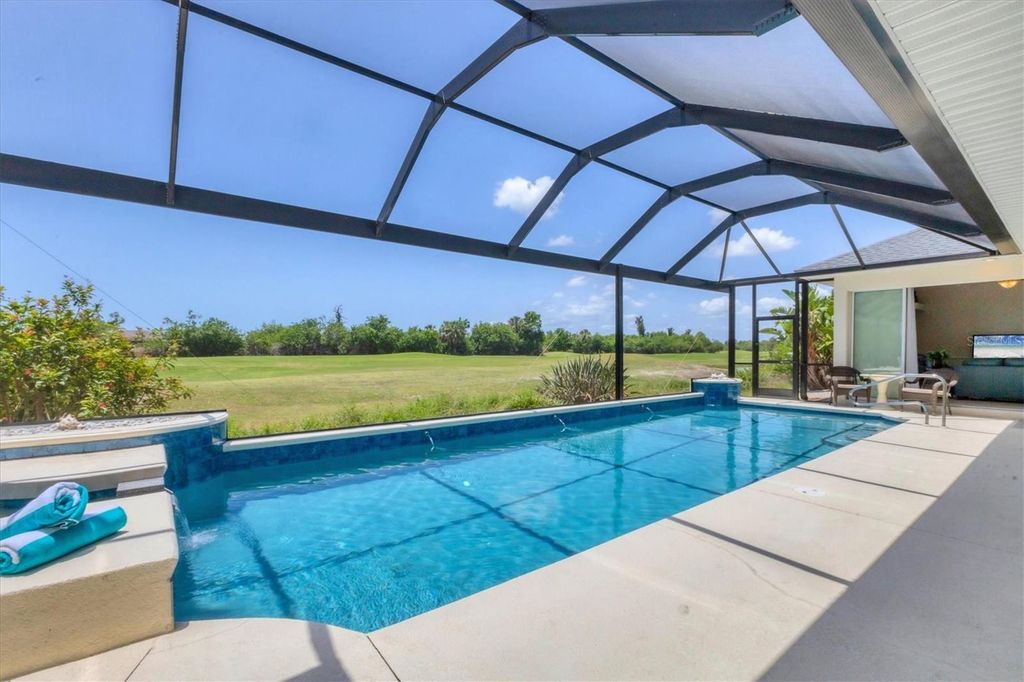 Photo of 1002 Rotonda Circle, Rotonda West, FL 33947 (MLS # D6142699)