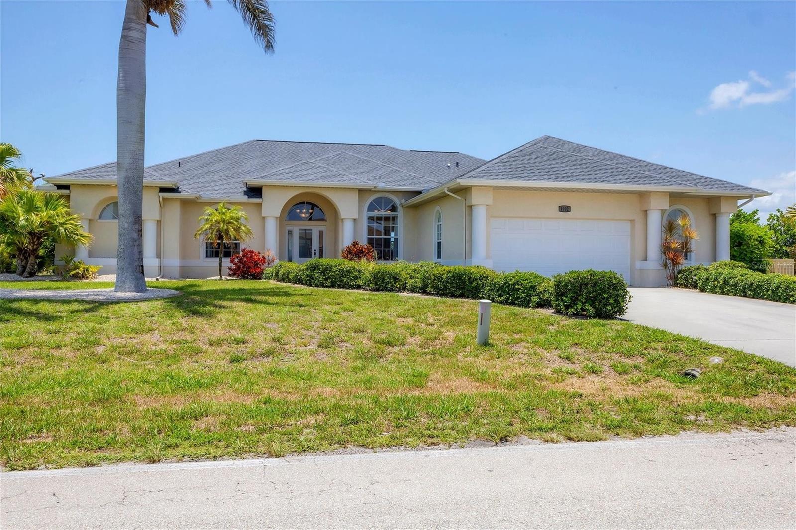 Tropical Golf Course Retreat! **TRIPLE LOT**
This stunning 3BR/4BA + office custom home is nestled on a spacious triple lot with a crystal-clear lap pool, spa, and panoramic golf course views in Rotonda West. Furnished and thoughtfully upgraded with a new roof, fresh exterior paint, electric hurricane shutters, full-house Generac generator, and a 2-car garage with golf cart space. The open-concept layout features tray ceilings, a chef’s kitchen, split floor plan, and multiple dining areas. The luxurious primary suite offers direct pool access and a spa-style bath. Enjoy seamless indoor-outdoor living with an expansive lanai—ideal for entertaining. The extra lot offers endless possibilities for future upgrades, whether it's cultivating a lush garden, expanding the home, or even selling the parcel as an investment. Close to beaches, parks, trails, and world-class golf. Low HOA and move-in ready—Florida living at its finest!