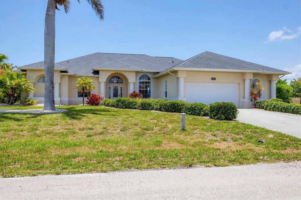 Photo of 1002 Rotonda Circle, Rotonda West, FL 33947 (MLS # D6142699)