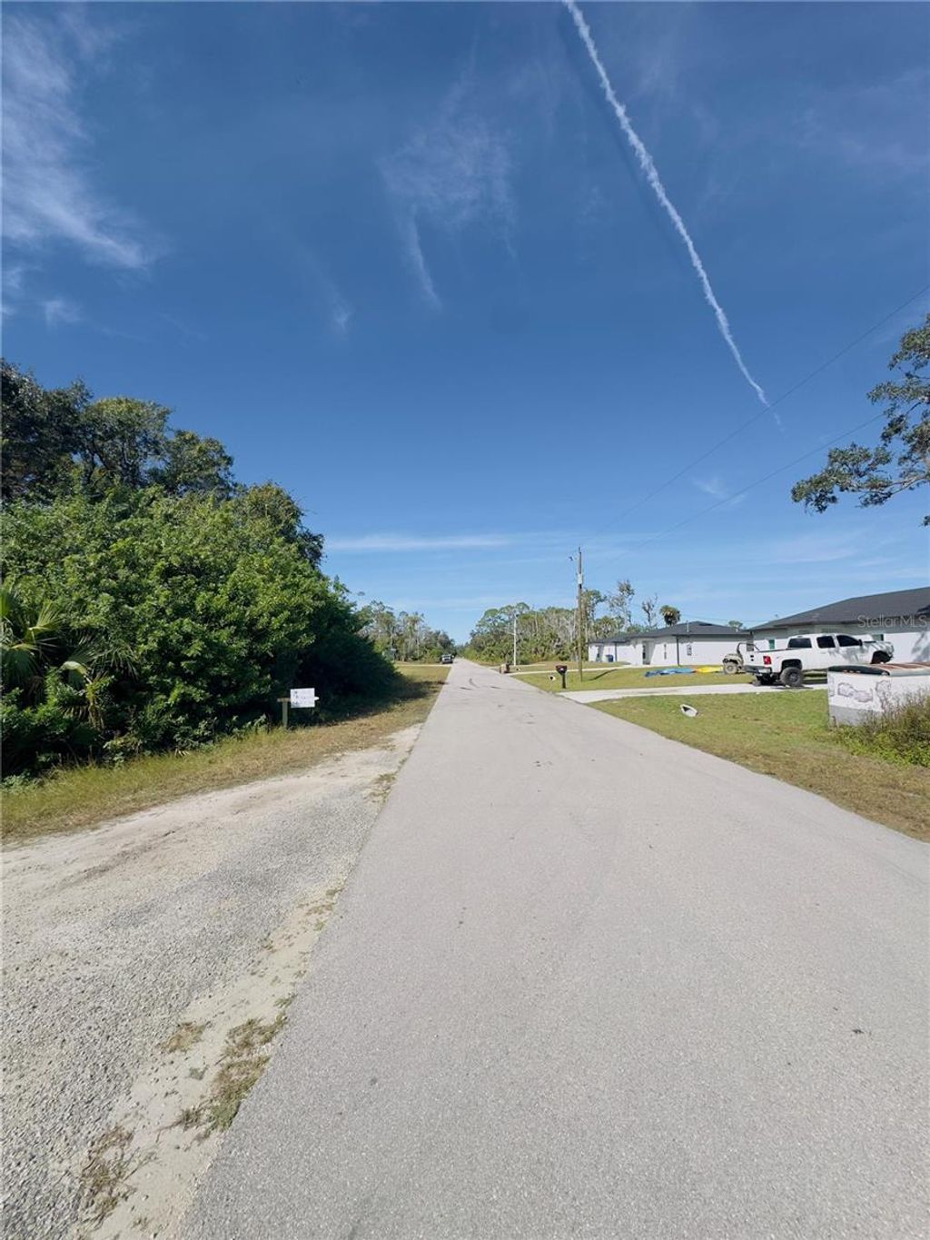 Photo of 1957 Mclaren Avenue, Lehigh Acres, FL 33972 (MLS # O6367919)