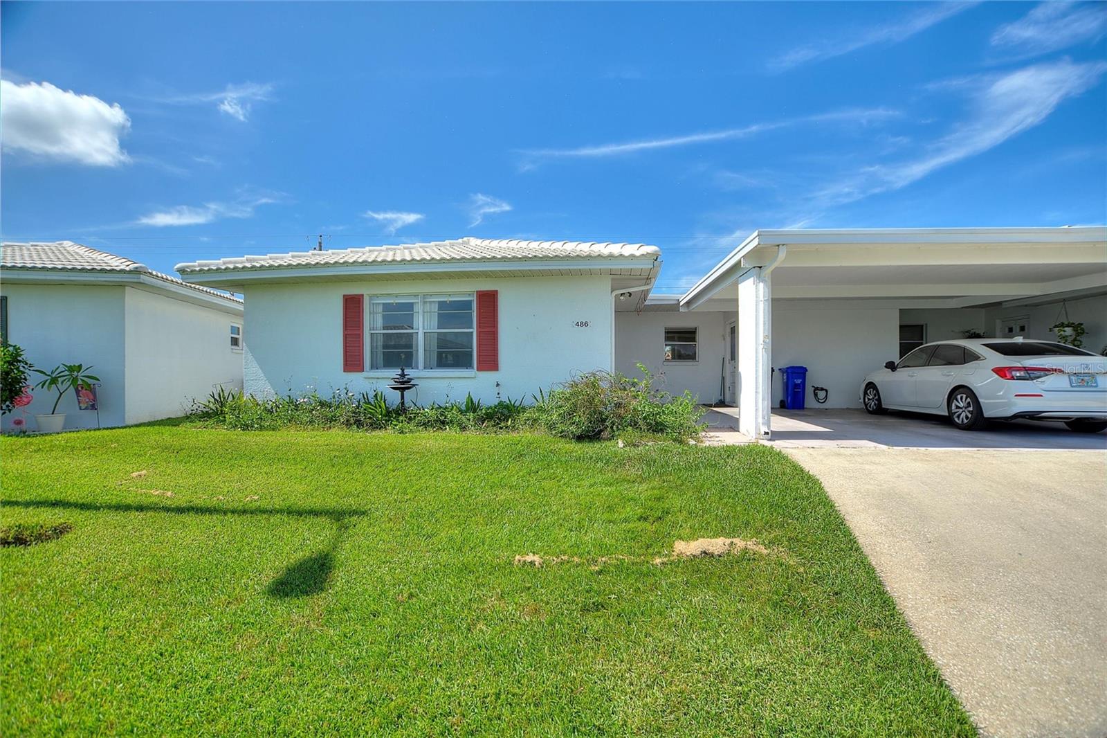 Lovely 2 Bed, 2 Bath unit located in the desirable Imperial Southgate Villas. THIS IS NOT A 55+ COMMUNITY, ALL AGES WELCOME! This unit has had tons of updates including a full RE-PLUMB, NEW HVAC, and TANKLESS WATER HEATER all in 2019! New tile roof in 2013! Beautiful wood-look laminate flooring throughout, NO CARPET! Imperial Southgate Villas is conveniently located right in the heart of Lakeland, just minutes to Wal-Mart, Publix, Sam’s Club, Target, Lowes, Lakeside Village, and so much more! Walkable to the City of Lakeland’s Kelly Recreation Complex which includes a fitness center, pool, Basketball, Tennis, Pickleball, and more! The very reasonable Condo Fee INCLUDES WATER, TRASH, AND SPECTRUM CABLE AND INTERNET! The association also paints the exterior of the buildings and is responsible for the flat roof over the carport and common area. This unit’s kitchen is spacious and offers high-end cabinetry, granite countertops, and stainless steel appliances. This unit offers tons of living space, including a large formal dining area and HUGE living room! The primary bedroom is complete with a walk-in closet and en-suite bathroom, a perfect place to unwind. The carport is a nice addition to condo life, with dedicated covered parking for one vehicle. Schedule your private showing today!