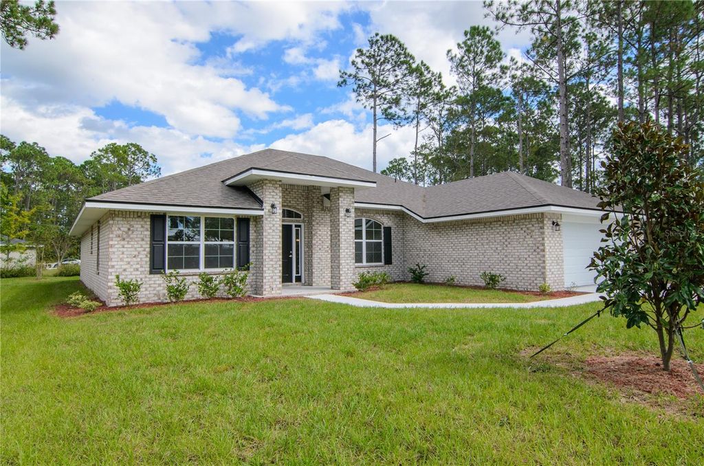 Photo of 5 Red Clover Lane, Palm Coast, FL 32164 (MLS # FC314711)