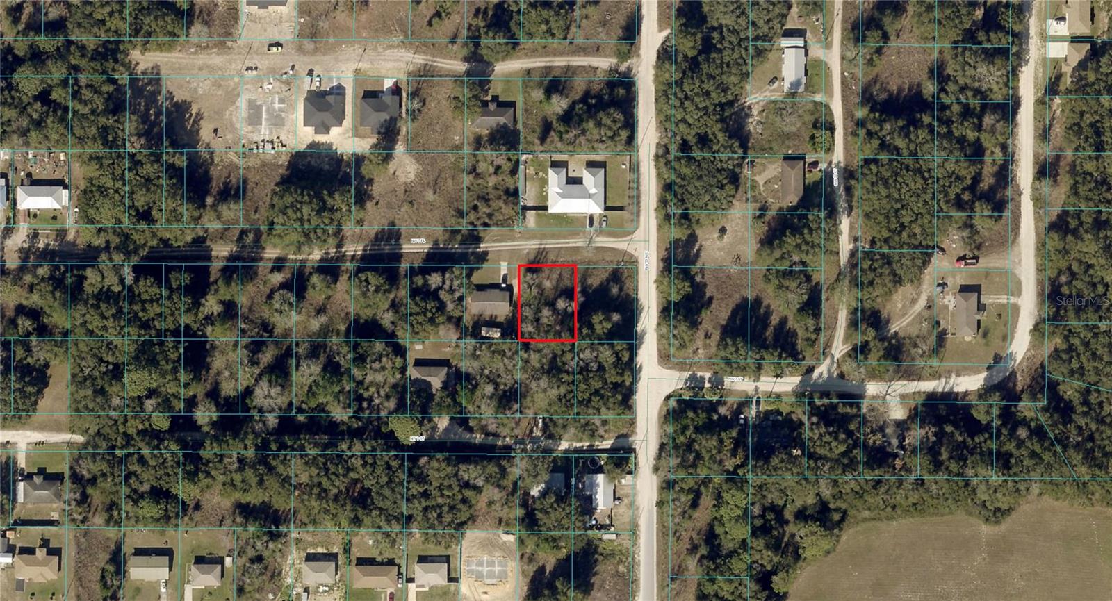 Just off the PAVED road in Ocala Ridge subdivision!. Lots of new single family homes going up in the neighborhood, also duplexes are allowed here with R-2 Zoning, but it seems to be mostly single family in the area. Excellent road quality, corner lot. Very close to downtown Ocala, 5 or 6 minutes to World Equestrian Center, the Ocala strip and everything else is just minutes away from this perfect in town location. Saved thousands of dollars and time not having to get trees removed from this lot to build. This lot is Marion County parcel 2307-110-001 . Approximately 7,405 Sq Ft. lot = 0.17 acres, a very good size being close to downtown. This lot was split off of a larger parcel. The street number listed in the address was made up for GPS mapping/driving purposes only and hasn't been assigned by the County yet. For directions, if you prefer you can copy and paste GPS Coordinates into Google Maps or Apples Maps, or use the address of a neighboring house. Or you can use GPS Coordinates: 29.194386, -82.208381. can use the address: 5332 NW 7th Pl, Ocala, FL 34482 (not official). This is Ocala Ridge Subdivision, and the seller has several other lots available in the subdivision. Buyer to confirm with Marion County about duplex building requirements if desired. Priced to sell quickly.
