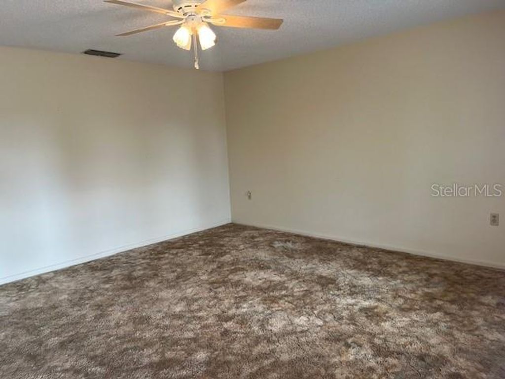 Photo of 845 W Pierce Street, Lake Alfred, FL 33850 (MLS # P4937155)