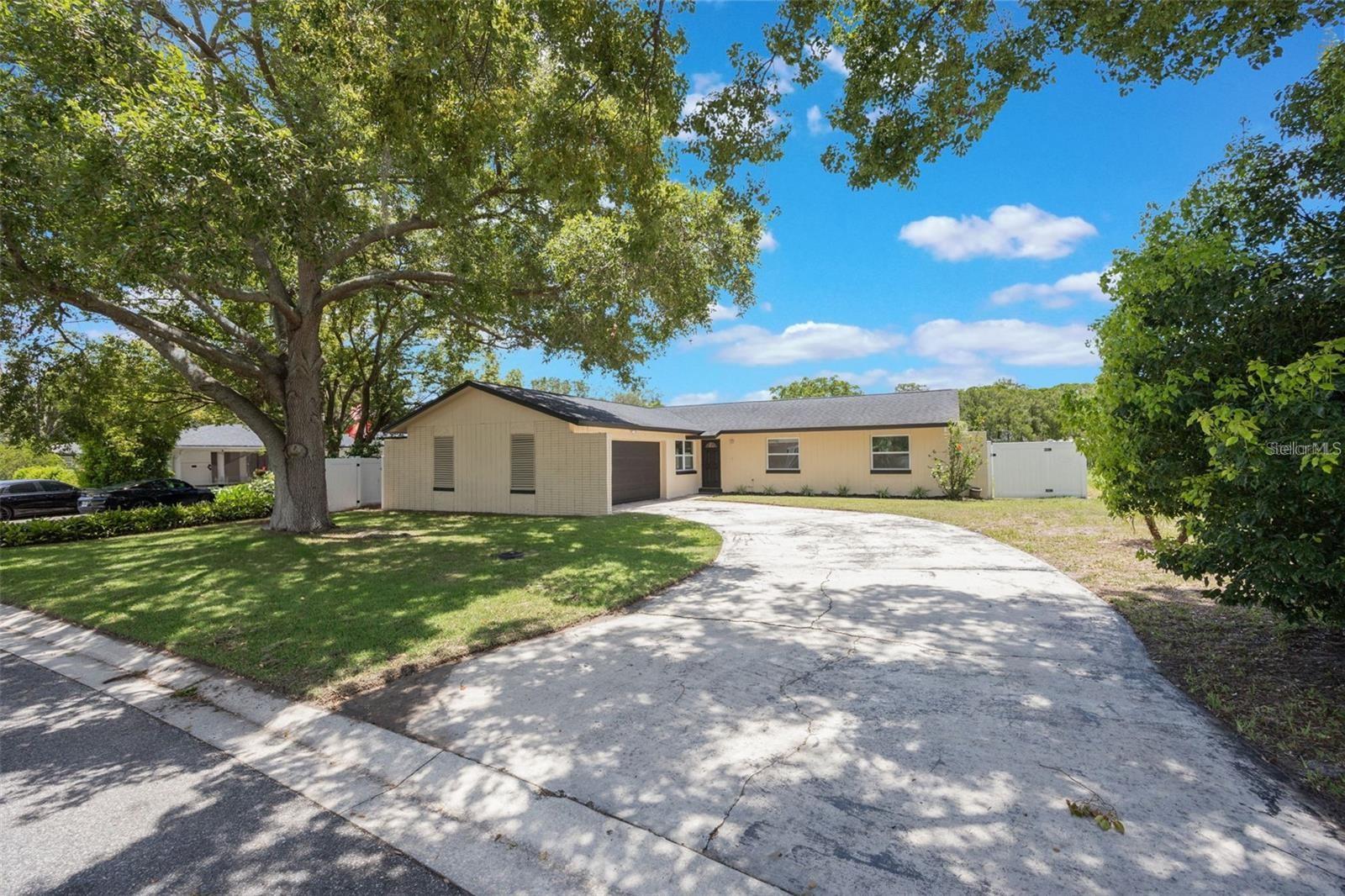 Impeccably Updated 4-Bedroom Home with Solar Panels! Welcome to your dream home in the highly desirable Sterling Park community! This beautifully maintained 4-bedroom, 2-bathroom residence seamlessly blends modern upgrades with timeless charm, offering true move-in-ready convenience and major long-term savings. One of the standout features is the fully paid-off solar panel system (2021), which significantly reduces monthly utility bills—often resulting in a near-zero electric cost. Enjoy the benefits of sustainable living and energy efficiency without the added expense. Inside, you’ll find an open and airy floor plan that’s ideal for both entertaining and everyday life. The spacious family room flows effortlessly into the kitchen and additional living areas, creating a warm, welcoming atmosphere. At the center of it all is a gorgeously remodeled kitchen featuring modern cabinetry, sleek countertops, updated appliances, and contemporary flooring—perfect for any cooking enthusiast or host. The primary suite offers a peaceful retreat with engineered wood flooring, a large walk-in closet, and a fully renovated en suite bath boasting elegant finishes. All guest bedrooms have been tastefully updated with new flooring, modern lighting, and newer windows for a fresh, cohesive look. Significant updates provide lasting peace of mind, including a newer roof, HVAC system, air ducts, fencing, all-newer windows-french doors, and this home has been recently re-plumbed—all major components addressed! To top it off, the exterior was professionally painted and landscaped in June 2025, giving the home excellent curb appeal. A two-car garage with a side utility door adds extra convenience. Step outside to a fully fenced backyard—perfect for pets, play, entertaining, or simply relaxing in your own private green space. As a resident of Sterling Park, you’ll have access to community amenities such as parks, a swimming pool, scenic lakes, and walking trails. Plus, you’re just minutes from shopping, dining, grocery stores, and top-rated Seminole County schools. This home is a rare find—beautifully updated, energy-efficient, and ideally located. Don’t miss your chance to make it yours. Schedule your private showing today!