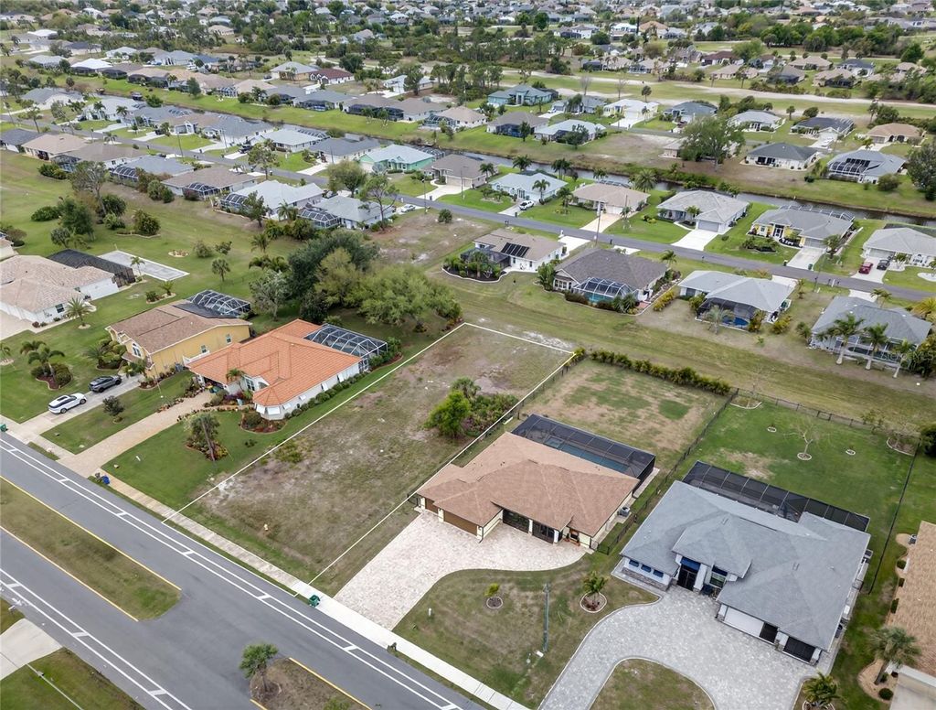 Photo of 211 Rotonda Boulevard N, Rotonda West, FL 33947 (MLS # N6143494)