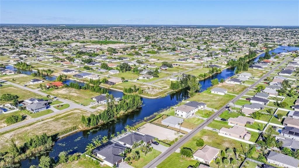 Photo of 31 NE 8th Terrace, Cape Coral, FL 33909 (MLS # D6146004)