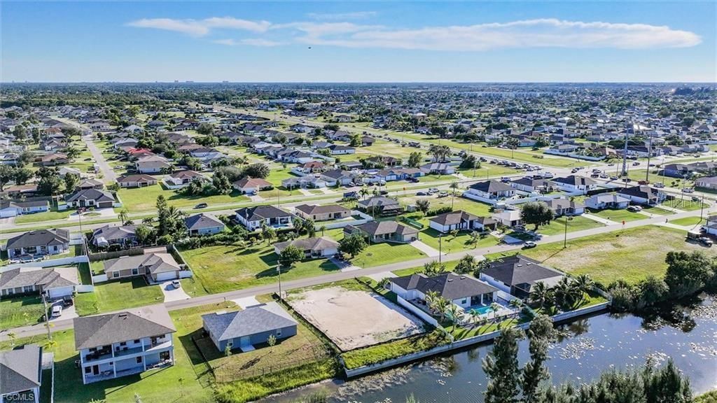 Photo of 31 NE 8th Terrace, Cape Coral, FL 33909 (MLS # D6146004)