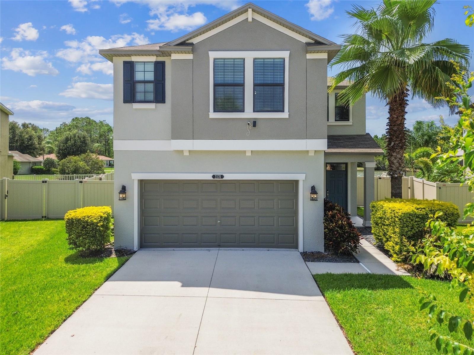 Beautifully Upgraded and Move-In Ready! Freshly painted both inside and out, this stunning two-story home offers 2,775 sq. ft. of thoughtfully designed living space. Featuring 4 spacious bedrooms, 2.5 bathrooms, a main floor home office, an upper-level loft, and a two-car garage—this home is ready to welcome its new owners. Step into the inviting foyer and you’ll immediately notice the upgraded light fixtures and Luxury Vinyl Plank flooring. To the left of the foyer is the double-door entry to your private home office. Down the hall, you’ll find a convenient mudroom with a built-in mail drop station, and a fully upgraded half bath showcasing a new vestibule, new vanity, new faucet, framed mirror, and updated light fixture. The main floor boasts luxury vinyl plank flooring throughout. Continue into the heart of the home where the open-concept layout shines. The fully renovated kitchen is a showstopper—featuring brand new upgraded stainless-steel appliances, including a fridge, gas range, dishwasher, and microwave. You'll love the upgraded kitchen cabinets with crown molding, built-in refrigerator casing, accented with navy cabinets in the island, premium hardware, and granite countertops, all illuminated by custom light fixtures over the island and in the dining area. This stylish kitchen opens seamlessly to the grand room and eat-in area, enhanced by upgraded ceiling fans in the grand room, new led lighting and upgraded window treatments. The numerous large windows providing an abundance of natural lighting and serene views of the pond and conservation. Step outside to the covered and screened lanai, overlooking a spacious fenced backyard, perfect for entertaining or adding your dream backyard oasis. Upstairs, a generous loft offers a flexible space ideal for a second living room, family game nights, or movie marathons.
The owner’s suite is privately located at the back of the home, offering a peaceful retreat with stunning conservation views. The ensuite bathroom features a walk-in shower, soaking tub, and dual sinks. From the owner's walk-in closet, you have direct access to an oversized laundry room, complete with GE washer and dryer and plenty of space to customize. The three additional bedrooms all feature oversized or walk-in closets. The upper-level bathroom has also been upgraded with new light fixtures, a new tub, and modern tiled shower walls.
Energy-Saving Features: Whole-house water softener and filtration system, Tankless gas water heater, Reclaimed water for irrigation
Located in the desirable Connerton community of Verona, this home is steps away from open park spaces and play areas—perfect for family fun or meeting neighbors. Enjoy the resort-style pool and splash park, multiple sports courts (basketball, tennis, volleyball), fitness center, scenic nature trails, and a packed calendar of community events at the clubhouse and outdoor amphitheater.
Connerton also offers an on-site elementary school and the new Pinecrest Academy, with a second clubhouse and the Ridge Road extension coming soon. You’ll love the convenient location near shops, dining, and the new Speros Moffitt Cancer Center.