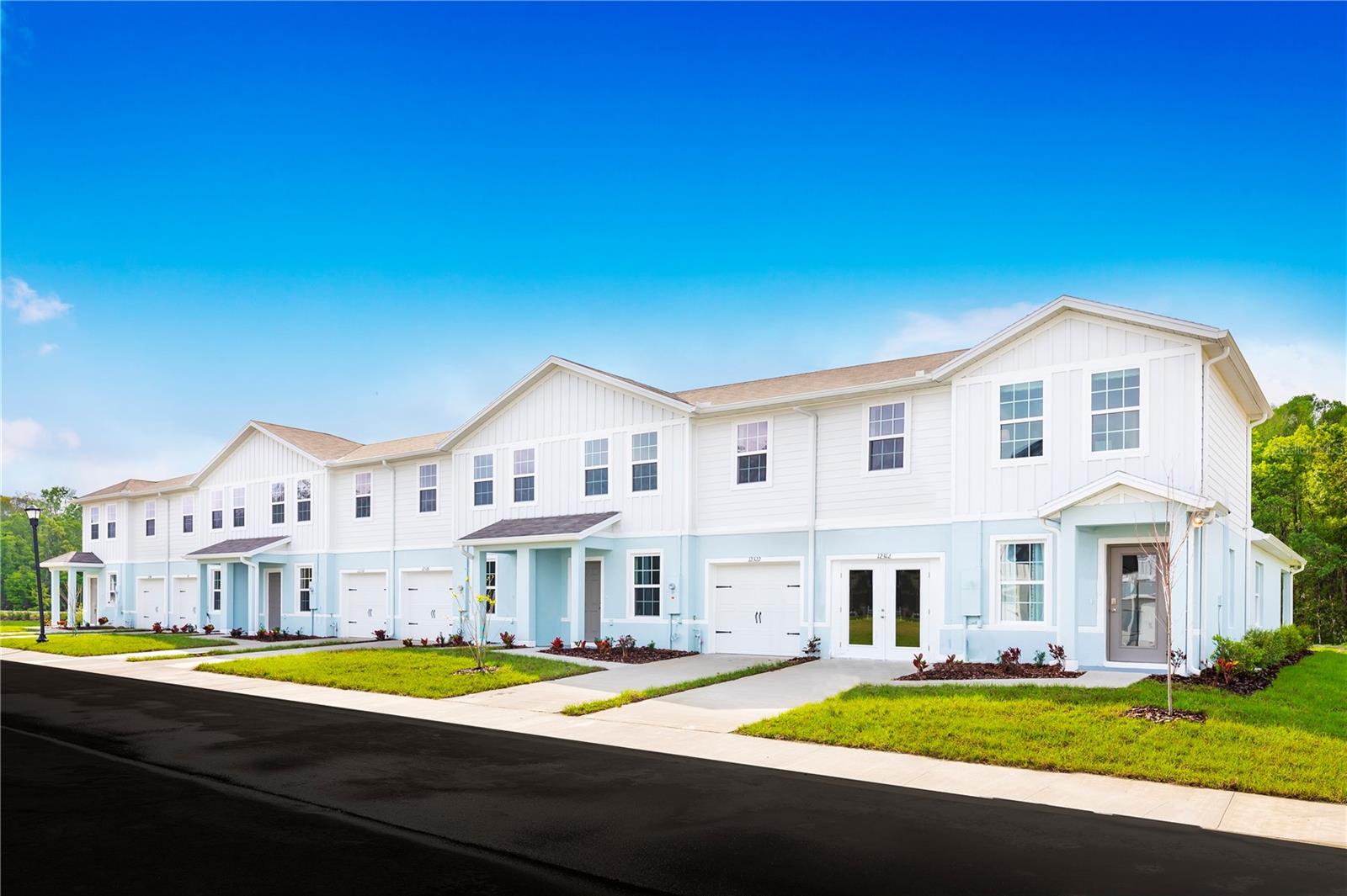 Pre-Construction. To be built. Welcome to Hammock Oaks Townhomes in Lady Lake! New townhomes in an all-ages master-planned community. 1-car garage, all appliances and lawn care included. We are conveniently located off State Road 466, with easy access to the area’s best golfing, shopping, recreation, dining, and major roadways. Step inside the Neptune and you’ll be greeted by a stunning great room, ideal for gathering with friends and family. Past a powder room, the formal dining space adjoins your gourmet kitchen. The large island offers versatile space you’ll love. Enjoy the fresh air on the private lanai. Your convenient one-car garage includes a storage closet and opens to the laundry room. Upstairs, two bedrooms each feature a walk-in closet, and open toward a full bath. Your luxury owner’s suite is ideally located on the main level, and includes its own dual vanity bath and a massive walk-in closet. All Ryan Homes now include WIFI-enabled garage opener and Ecobee thermostat. **Closing cost assistance is available with use of Builder’s affiliated lender**. DISCLAIMER: Prices, financing, promotion, and offers subject to change without notice. Offer valid on new sales only. See Community Sales and Marketing Representative for details. Promotions cannot be combined with any other offer. All uploaded photos are stock photos of this floor plan. Actual home may differ from photos.