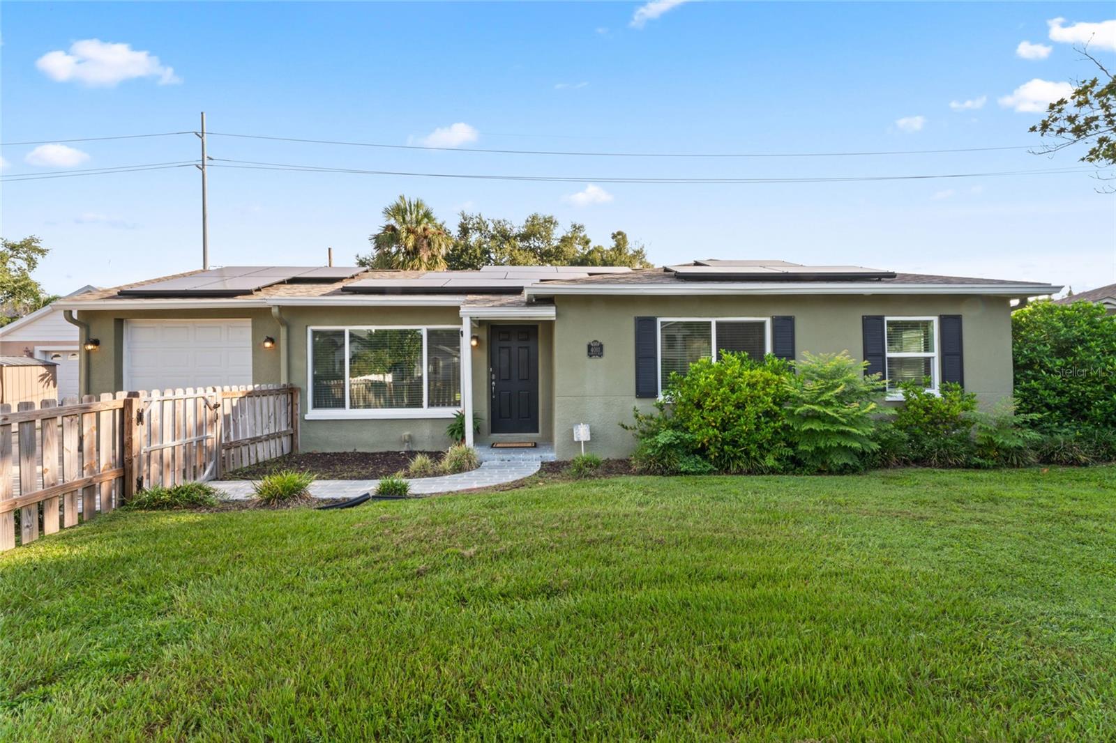 Welcome to your dream home in the heart of South Tampa! Situated within the highly desirable Roosevelt, Coleman, and Plant school districts, this residence perfectly balances comfort, style, and convenience for both families and professionals. Located in Flood Zone X, flood insurance is not currently required.
The main home features three spacious bedrooms and two bathrooms, including a primary suite with a walk-in closet and private ensuite bathroom. Multiple living and dining areas provide the ideal layout for everyday living and entertaining. A one-car garage and extended driveway ensure plenty of parking for family and guests.
Step outside to enjoy an expansive, fully fenced backyard that doubles as your private retreat. Perfect for gatherings, the backyard also leads to a newly constructed 425-square-foot guest house complete with its own kitchen, living room, bedroom, and full bathroom. Whether for guests, extended family, or a private office, this space offers exceptional flexibility. Additional highlights include a large temperature-controlled storage shed for all your storage needs.
This energy-efficient home is equipped with solar panels for minimal electric costs and features numerous updates, including a newer roof (2019), newer AC (2020), hurricane-impact windows, and a fully insulated attic for year-round comfort.
Located minutes from Tampa’s best shopping, dining, entertainment, and the scenic Bayshore Boulevard, this home offers the best of South Tampa living.
Don’t miss the chance to make 4011 W El Prado Blvd. yours. Schedule your private showing today!