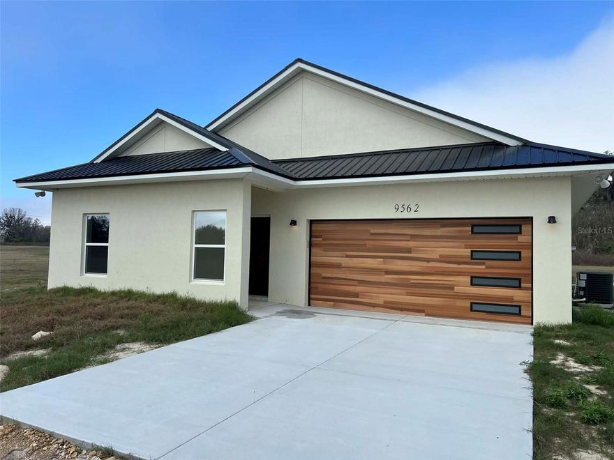 Custom built 3 bedroom 2.5 bath home situated on 10 private acres, offering a unique modern floor plan designed for comfort and functionality.  This thoughtfully designed home features numerous upgrades throughout, spacious living areas, and plenty of natural light.  Enjoy the privacy and possibilities of acreage living while still having a stylish, modern home to call your own.  Ideal for those seeking space, flexibility and a distinctive property.