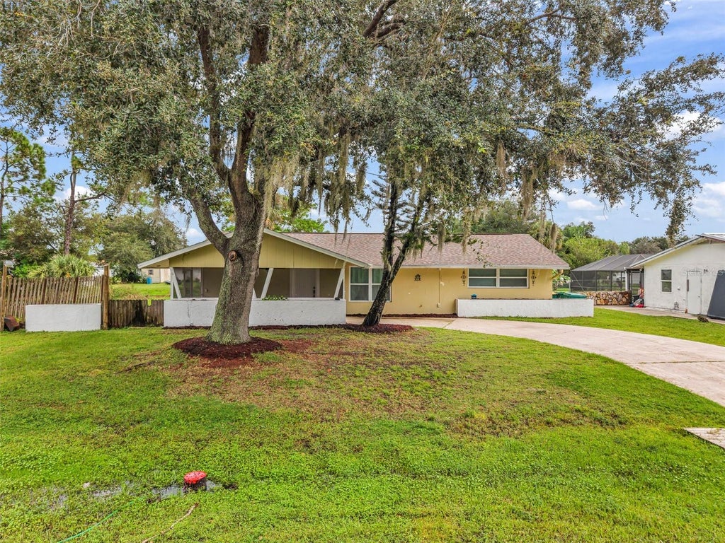 Photo of 424 Vannell Street, Port Charlotte, FL 33954 (MLS # C7531657)