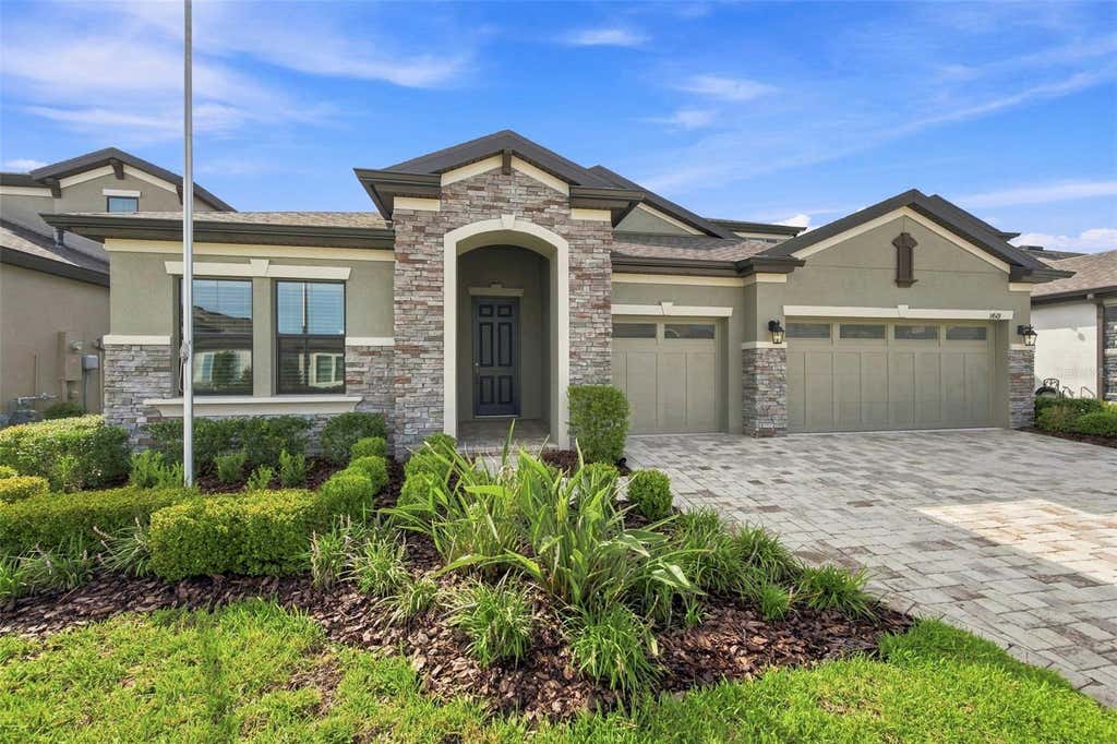 Photo of 14519 Woodland Spur Drive, Lithia, FL 33547 (MLS # TB8540028)