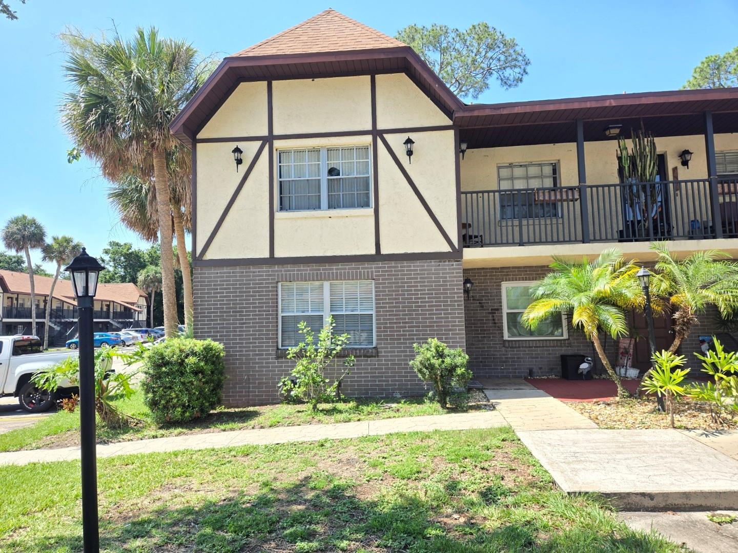 First floor, end unit condo in Camelot Estates! Close vicinity to Titus Landing, shopping, medical and the Indian River. The spacious living room has an adjoining dining area. Open style kitchen with breakfast bar, flat top stove and built-in microwave to include upscaled kitchen cabinets. Bright and open in this one bedroom, one bath condo - feels very spacious. The oversize bedroom with entire wall of closet space includes sliders to the screened-in porch. Private washer and dryer located in the storage area in the screened porch. The porch overlooks green area and close to the community oversize pool for all your summer needs!