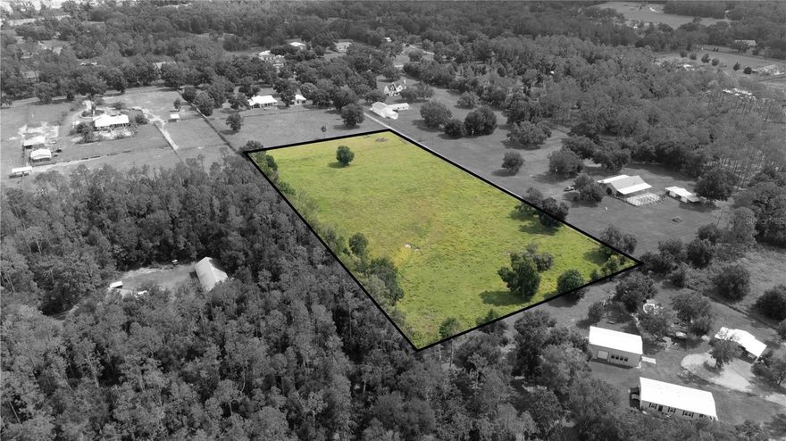 Trade city lights for starry nights on this picturesque 5.02 acre slice of Dade City paradise!
Zoned AR5, this versatile property welcomes agricultural use, making it perfect for those
dreaming of space for horses, livestock, or a flourishing homestead. With no flood zone
restrictions, you can confidently design and build the home and lifestyle you’ve always
envisioned in the heart of Dade City’s scenic countryside. Enjoy the tranquility of wide-open
spaces while staying conveniently close to downtown Dade City, charming San Antonio, the
country’s largest Lagoon- Mirada, and quick highway access for commuting or weekend
adventures. Call us today for your private peek at this gorgeous property!