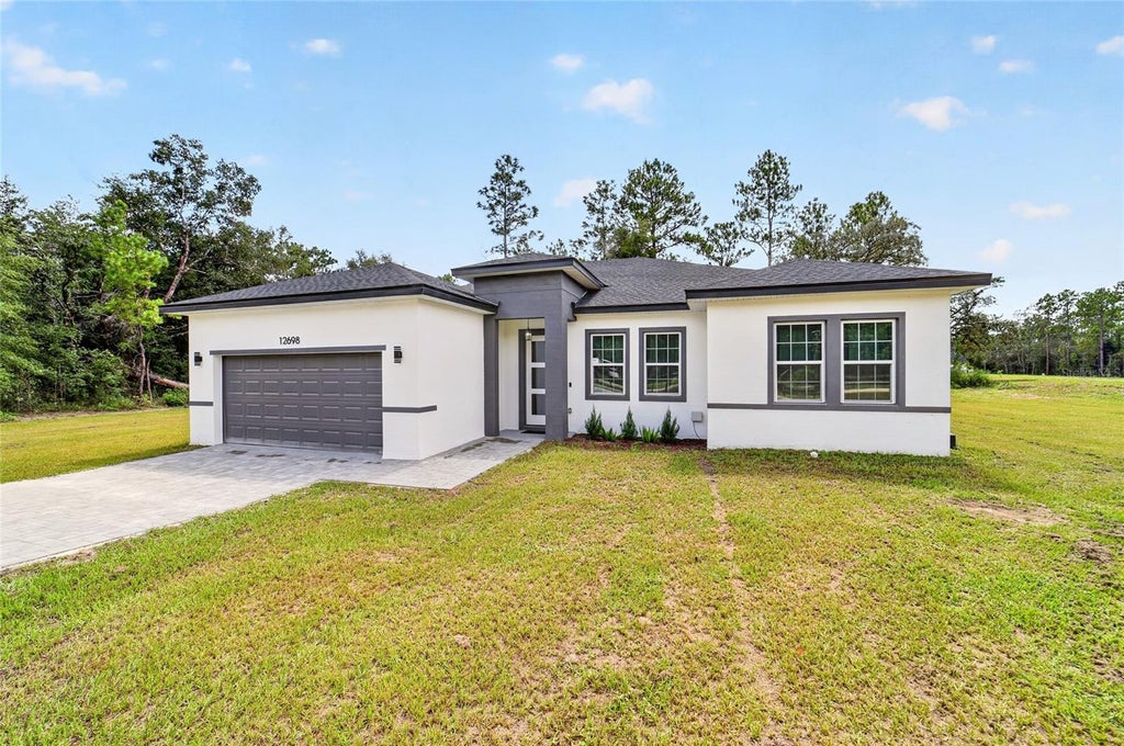 Photo of 12698 SW 80th Street, Dunnellon, FL 34432 (MLS # OM732177)