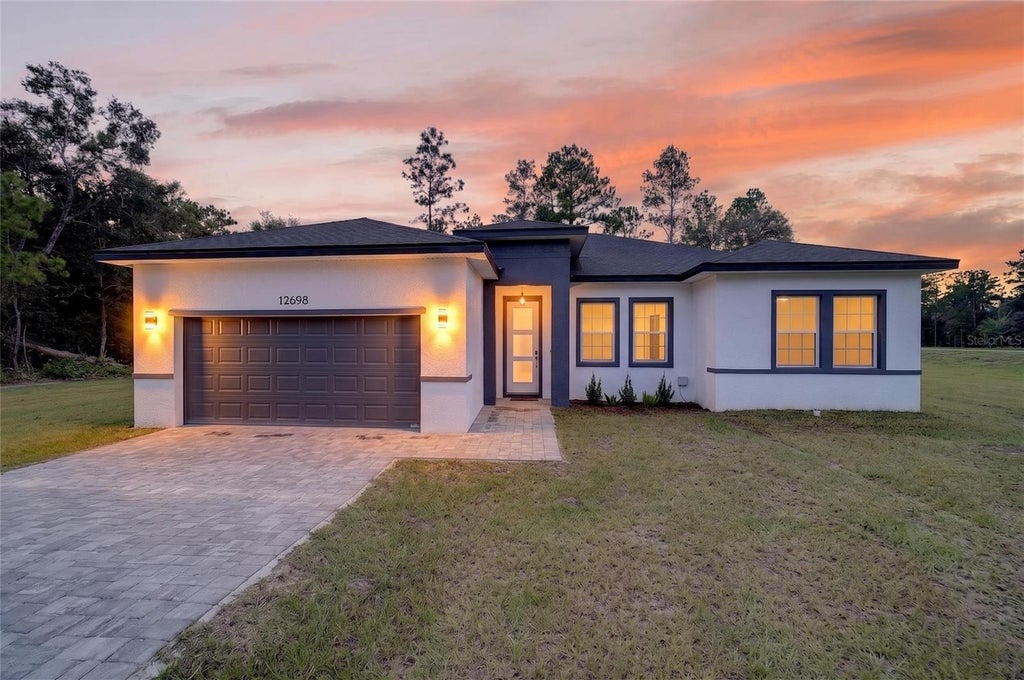 Photo of 12698 SW 80th Street, Dunnellon, FL 34432 (MLS # OM732177)
