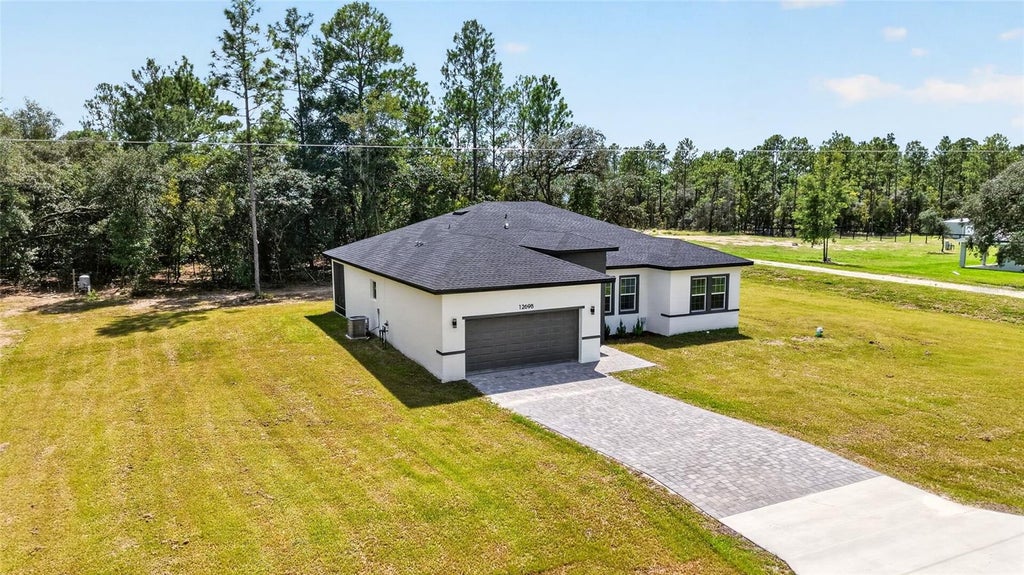 Photo of 12698 SW 80th Street, Dunnellon, FL 34432 (MLS # OM732177)