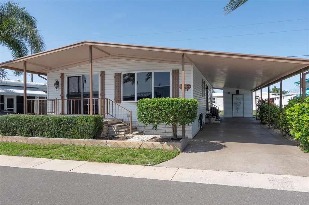 Photo of 34236 Canal Drive N #236, Pinellas Park, FL 33781 (MLS # TB8488145)