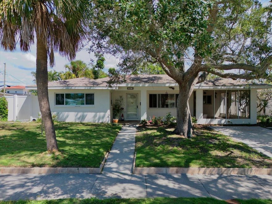 This charming 2 bedroom, 2 bathroom home has been a place of joyful memories for over 50 years. While it has experienced flooding, it's ready for the new owners to envision its next chapter. Just a few blocks from both the beach and bay, you'll have easy access to breathtaking sunrises and unforgettable sunsets just two blocks away. Located on the serene North end of Clearwater Beach, life here moves at a relaxed island pace. Come see the possibilities and start creating memories of your own!