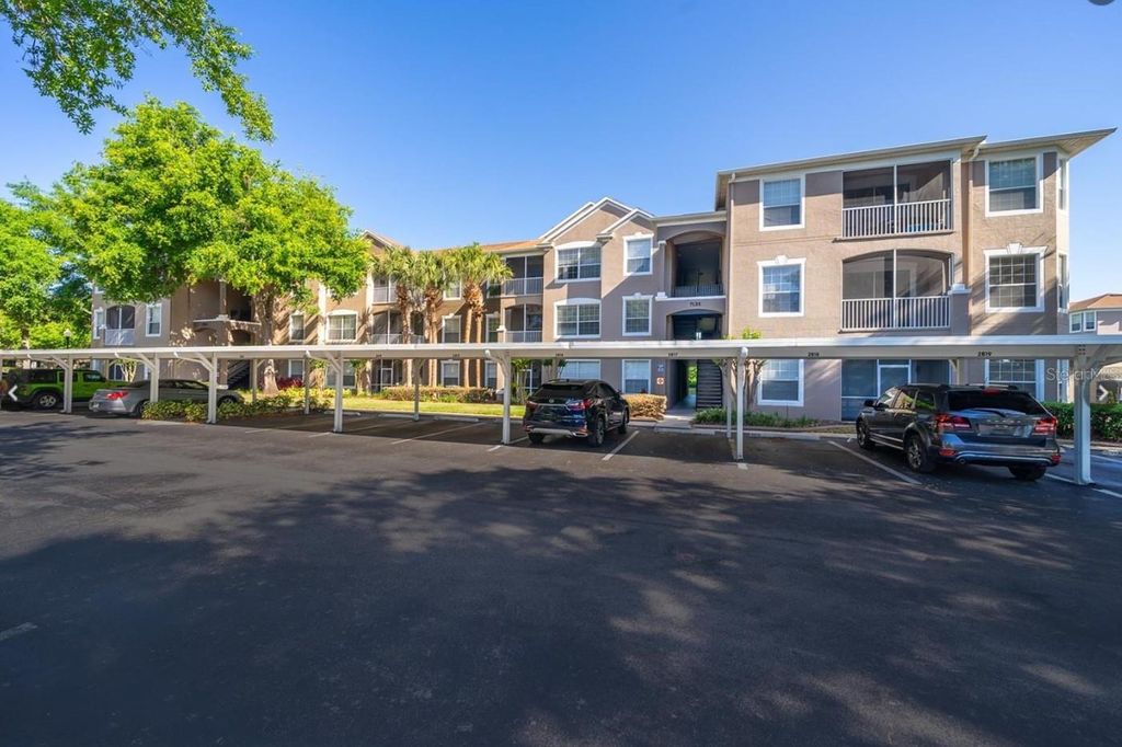 Photo of 7135 Yacht Basin Avenue #236, Orlando, FL 32835 (MLS # O6414518)