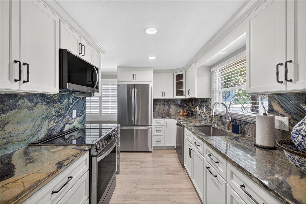 Photo of 4937 Blue Heron Drive, New Port Richey, FL 34652 (MLS # W7879505)