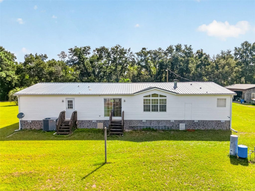Photo of 12040 SE 94th Court, Belleview, FL 34420 (MLS # G5118006)