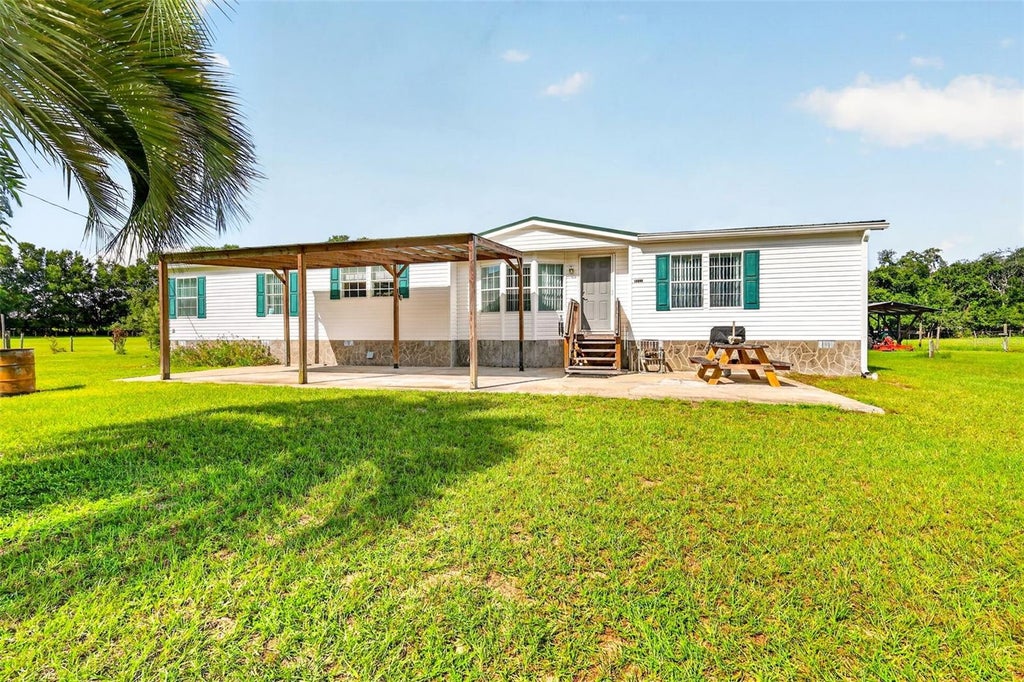 Photo of 12040 SE 94th Court, Belleview, FL 34420 (MLS # G5118006)