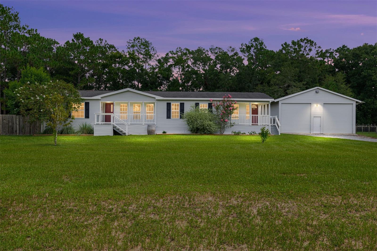 Welcome to 825 NW 107th Court in Ocala, a beautifully remodeled three-bedroom, two-bath split floor plan home situated on 1.02 acres. Offering 1,602 square feet of living space, this property combines modern updates with functional features designed for comfort and enjoyment.
Inside, you’ll find new windows, updated flooring, crown molding throughout, and hand-crafted soft-close wood cabinets. The primary suite includes two walk-in closest with built-ins and a remodeled bathroom featuring new tile in the shower. Additional updates include a roof and HVAC system replaced in 2017 and a hot water heater installed in 2023.
The outdoor living space is designed for entertaining and relaxation with a large deck that leads to an above-ground pool, a privacy-fenced backyard, and a dedicated deck spot with 50-amp electrical service ready for a hot tub or summer kitchen. A fire pit adds to the inviting atmosphere. For the car enthusiast, the property also includes a 30’x40’ shop with 12-foot roll-up doors and a 9,000-pound lift.
Located just minutes from the World Equestrian Center, this home has no HOA or lease restrictions, making it a wonderful primary residence or an excellent short-term rental opportunity.