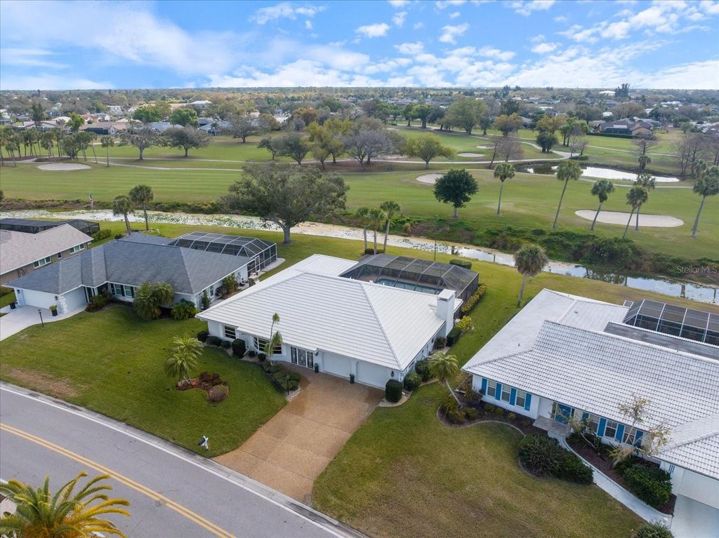 Photo of 952 E Gondola Drive, Venice, FL 34293 (MLS # TB8481472)