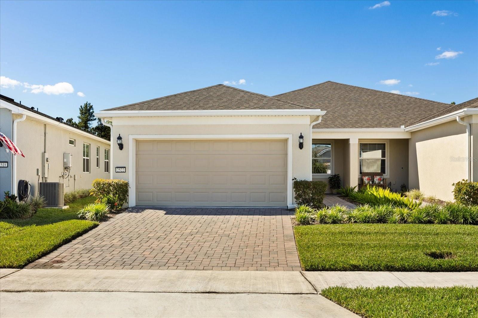 Why wait a year for new construction—with all the potential delays and uncertainties—when you can move right into a home that looks and feels brand new?
Welcome to Del Webb Sunbridge, Central Florida’s premier 55+ community where luxury, comfort, and connection come together seamlessly.
This beautifully appointed 2-bedroom, 2-bath villa with a versatile flex room offers 1,584 square feet of thoughtfully designed living space, featuring peaceful conservation views from the screened-in back porch.
From the pavered driveway and walkway to the inviting front entry, this home impresses from the start. Inside, you’ll find elegant tile floors, tall ceilings, crown molding, and an abundance of natural light that creates an open, airy atmosphere.
The gourmet kitchen is a showstopper, showcasing 42” cabinetry, quartz countertops, a large center island with extra storage and a breakfast bar, plus stainless steel appliances—including a gas range. Perfect for entertaining, the kitchen flows effortlessly into the spacious living room, where sliding glass doors open to the screened porch overlooking tranquil conservation.
The primary suite is a serene retreat, perfectly positioned to capture lush conservation views for added privacy and relaxation. This space exudes sophistication with a spa-like ensuite bath featuring a custom-tiled walk-in shower with bench seat, dual-sink quartz vanity, and an expansive walk-in closet.
Additional highlights include a Yarna water ionizer, a two-car garage with epoxy flooring and an EV charger, and included exterior (roof and paint) and lawn maintenance for a truly carefree lifestyle.
At Del Webb Sunbridge, you’ll enjoy world-class amenities within the 27,000 sq. ft. Hammock Club, featuring a resort-style zero-entry pool, state-of-the-art fitness center, pickleball and tennis courts, and a dog park. Dine at the Sabal Tavern, enjoy live entertainment at the outdoor amphitheater, or explore your creative side in the arts and crafts studio and event kitchen. From social clubs to wellness programs, every detail has been designed to elevate everyday living.
Ideally located near Lake Nona, Narcoossee Road, and Highway 417, this gated community offers easy access to the best of Orlando while maintaining the tranquility of a beautifully landscaped neighborhood.
Experience the best of luxury, leisure, and lifestyle. Welcome home to Del Webb Sunbridge! Make your appointment for your private tour of this special home today!