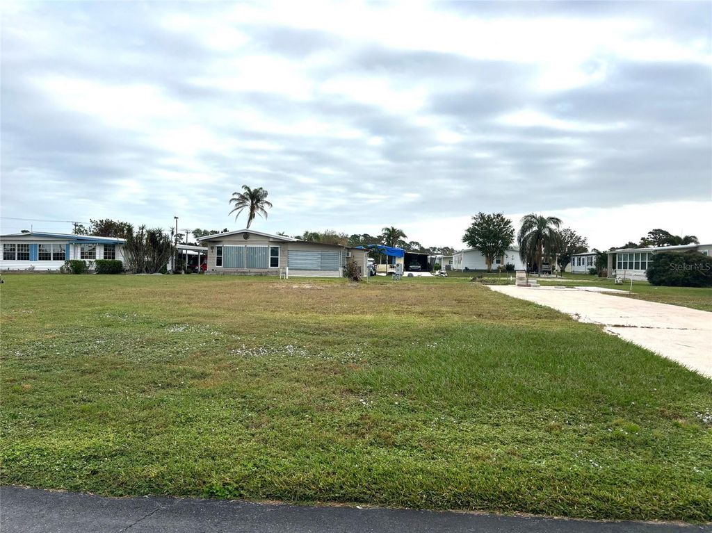 Photo of 401 El Prado Ave, North Port, FL 34287 (MLS # TB8317935)