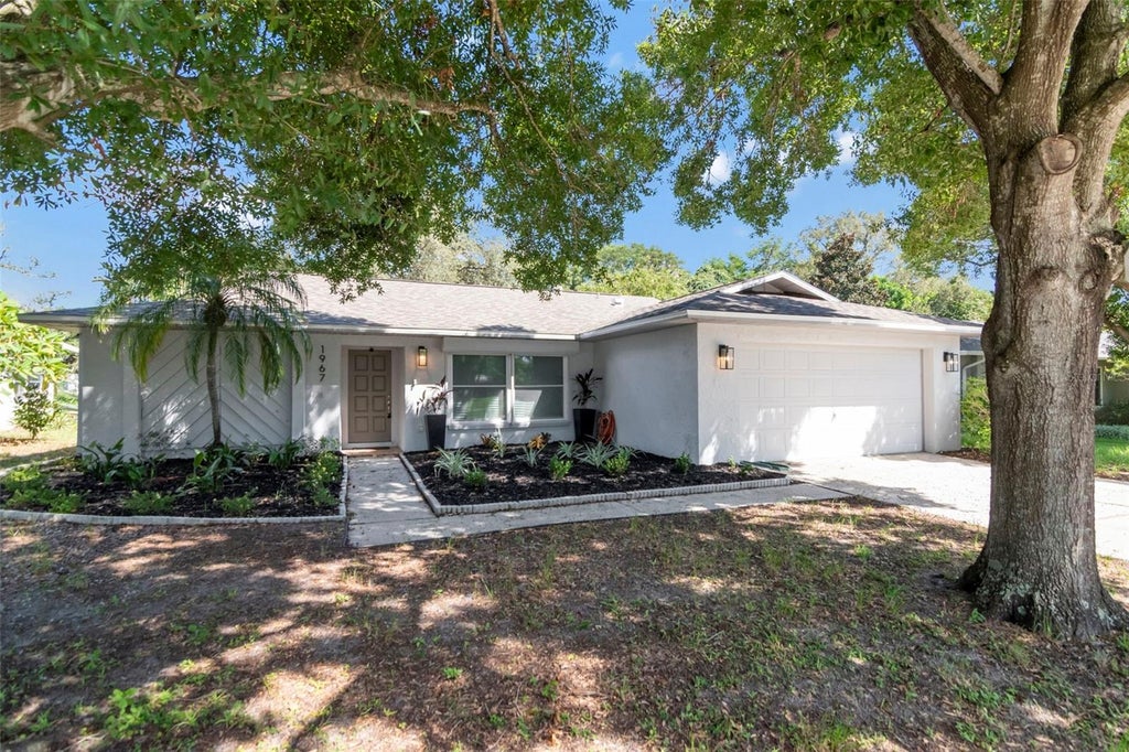 Photo of 1967 Beckett Lake Dr, Clearwater, FL 33763 (MLS # TB8549883)