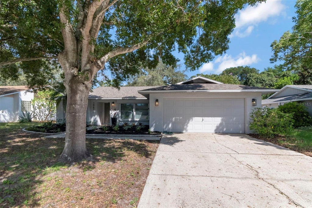 Photo of 1967 Beckett Lake Dr, Clearwater, FL 33763 (MLS # TB8549883)