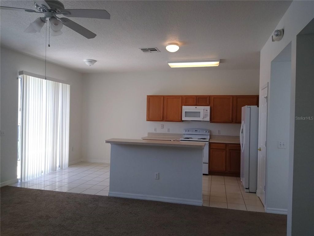 Photo of 1077 Berkeley Drive, Kissimmee, FL 34744 (MLS # S5142061)