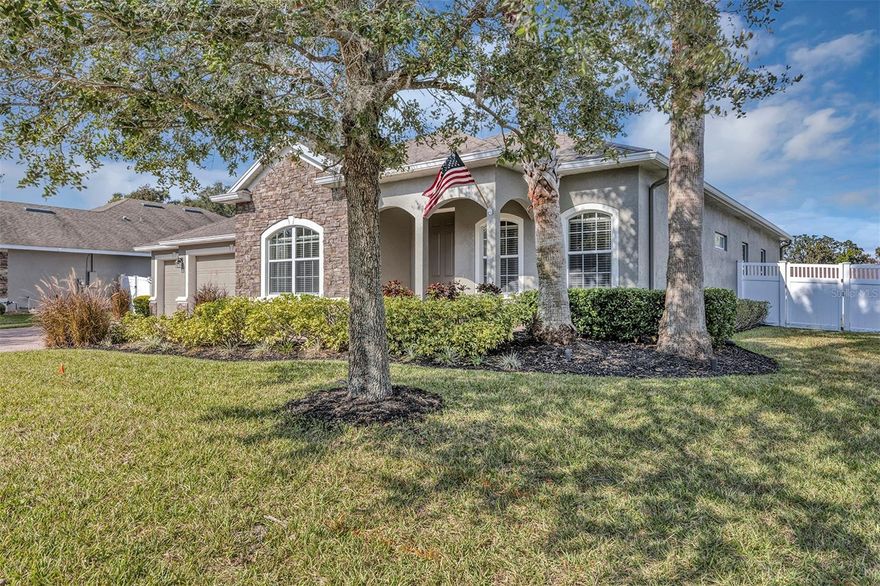 This beautifully updated home sits on an oversized fenced lot with a rare 3-car garage and extended backyard — an incredible find in Historic Winter Garden. Step inside to wood-look tile floors, a bright open layout, and a flexible front bonus room ideal for an office, playroom, or guest space. Featuring a gorgeous kitchen built for entertaining with stainless steel appliances, granite counters, and a huge island overlooking the dining area and spacious family room.
The primary suite offers a private backyard entrance and a rare extended flex space perfect for a nursery, gym, or cozy reading nook. Two additional bedrooms sit on the opposite side of the home with a cabana bath that opens to the patio.
Enjoy Florida living on the brick-paved covered lanai and expansive backyard. With unbeatable proximity to Downtown Winter Garden’s shops, dining, Farmers Market, and year-round events, this is the ideal home for anyone wanting charm, convenience, and lifestyle in one.