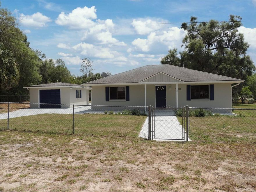 COMPLETELY REFRESHED, MOVE-IN READY CONCRETE BLOCK HOME ON A SPACIOUS CORNER LOT!

Welcome to easy country living in this beautifully updated 2 bedroom, 2 bath home ideally located between Williston and Bronson, just off Highway 27Alt for a quick commute to town while still enjoying peaceful surroundings. Situated on a generous 0.44 acre corner lot, this property offers space, privacy, and functionality all in one.

Step inside to discover over 1,500 square feet of comfortable living space, featuring a bright and inviting family room perfect for relaxing or entertaining. Family room has a full bathroom with a tiled stall shower and hall bathroom has a tiled tub/shower combination.
Outside, the fully chain-link fenced yard provides a secure space for pets, play, or gardening, while the detached garage with additional storage area ensures you’ll have room for vehicles, tools, and hobbies. An inside laundry room adds everyday convenience to this well-designed home.

Whether you’re looking for a full-time residence, a weekend retreat, or an investment opportunity, this solid concrete block home delivers durability, comfort, and value in a desirable rural location—just minutes from Williston, Bronson, and an easy drive to Gainesville or Ocala.

Don’t miss your chance to own this move-in ready gem with room to spread out and enjoy the Florida lifestyle!