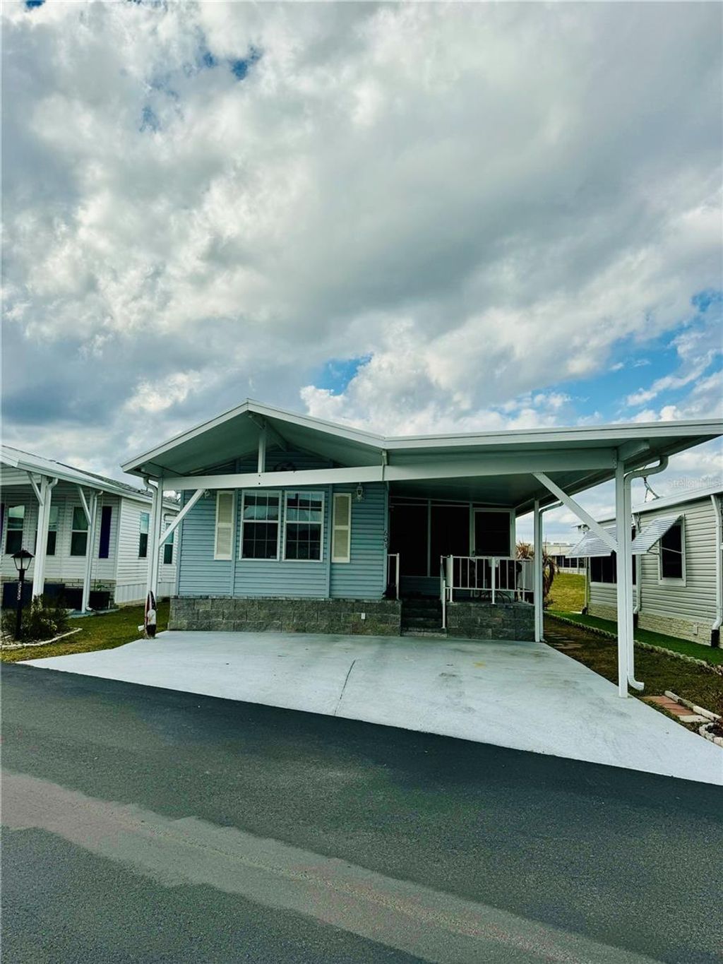 Photo of 603 Arnold Palmer Drive, Davenport, FL 33837 (MLS # O6387129)