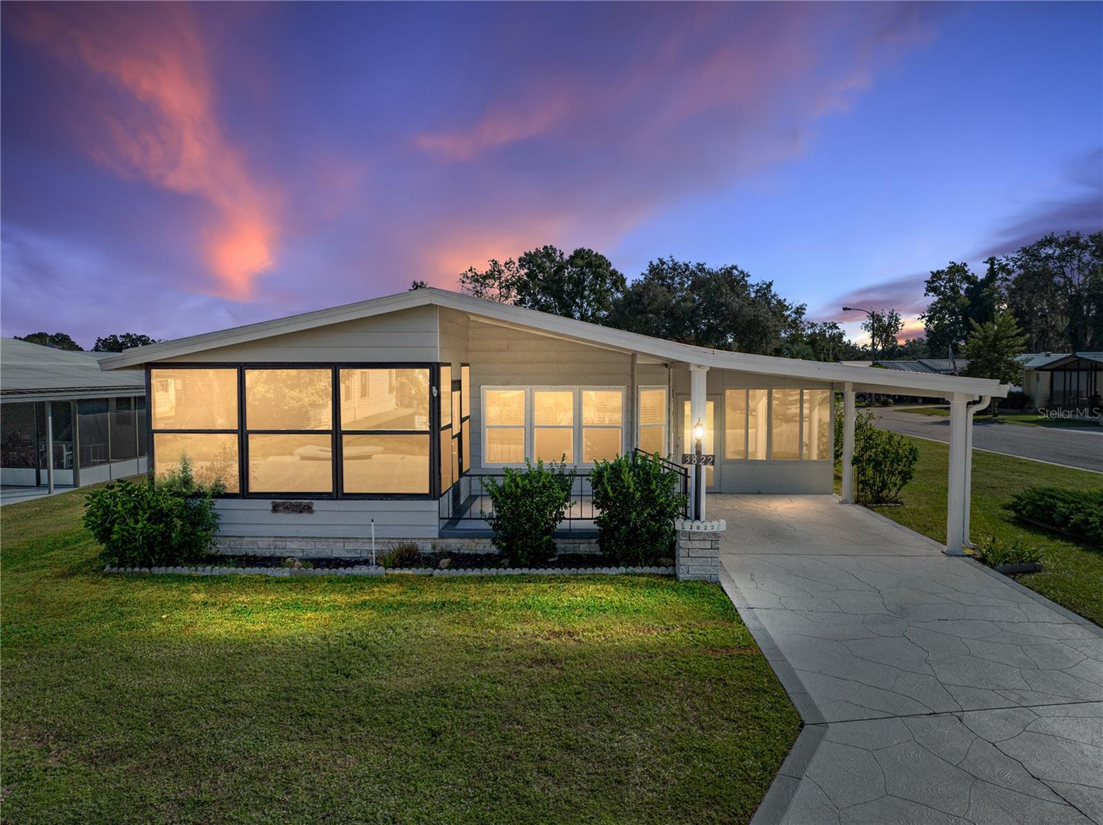 Nestled within the active 55+ community of Colony Hills, this 2 bedroom, 2 bath, 1,248 sq ft
manufactured home offers a welcoming lifestyle where you own the land and enjoy access to
fantastic amenities. The newly painted 2023 exterior, complete with landscaping, is
complimented by 3 inviting outdoor spaces to relax and unwind- an enclosed front porch, an
open-air patio, and a Florida room on the side that connects to an oversized laundry room and
workshop! Inside, the spacious, light-filled living room features newer flooring, a sliding glass
door to the front porch, and plenty of room to entertain. The centrally located kitchen sits
between two dining spaces, creating an effortless flow for everyday living. It offers ample
cabinet storage, generous prep space, a four-piece white appliance package including a 2021
refrigerator, newer flooring, a 2025 disposal, and a cozy eat-in dinette with a ceiling fan. Just
beyond, the formal dining room adds character and storage with built-in cabinetry. A sizable
primary suite with new flooring, dual closets, and an expansive ensuite bathroom with both a
walk-in shower and a separate soaking tub, is the perfect place for rest at the end of a long day.
The guest bedroom is conveniently positioned across from the home’s second full bathroom,
providing ease for visitors. 2013 Roof | 2017 AC | 2022 Washer | 2023 Exterior Paint | $1,000 in
anchor and strap upgrades. At Colony Hills, residents enjoy a friendly, active community with a
clubhouse, pool, spa, shuffleboard, tennis and pickleball courts, and an array of social events
throughout the year. Schedule your private showing today and discover why so many love
calling Colony Hills home!