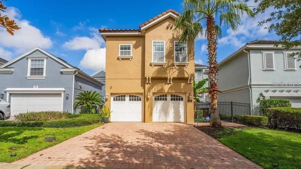 This one-of-a-kind, turnkey luxury estate is in the exclusive, gated golf course community of Reunion Resort. Fully furnished and designed for upscale living, this immaculate two-story home spans over 3,100 sq ft. and includes a newly renovated detached in-law suite. The main house features 3 spacious bedrooms, each with its own private bath, plus 3 bathrooms. The detached in-law suite offers 1 bedroom and 1.5 baths, providing additional privacy and versatility. This stunning property boasts 8-foot doors, 16" tile flooring, crown molding, and French doors leading to porches and balconies with breathtaking views of the Arnold Palmer-designed golf course, multiple fairways, and nightly Disney fireworks. Relax in the heated courtyard pool with a spa for ultimate comfort. Located in Reunion Resort, this home offers access to world-class amenities, including three championship golf courses (Palmer, Watson, and Nicklaus), on-site dining, a water park, 13 community pools, tennis courts, and a luxurious day spa. With convenient access to I-4 and 429, you'll be just minutes away from Central Florida's top attractions and entertainment. Services include lawn care, irrigation, interior and exterior pest control, 6 HD cable boxes, high-speed internet, 24-hour gated security, and more ensuring effortless luxury living. Don't miss the chance to rent this exceptional home in one of Central Florida's most resort communities!