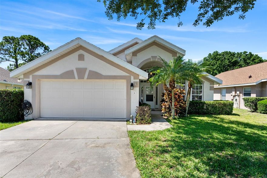 BACK ON MARKET due to buyers home sale contingency not closing. This charming three bedroom two bath block home is nestled in the picturesque community of Pelican Bay in Daytona Beach, Florida. With a spacious 1559 square feet of living space, this well-maintained home boasts plenty of natural light and an open floor plan perfect for entertaining. As you step inside, you will notice the stylish luxury vinyl plank flooring that has been freshly installed throughout the main living areas, giving the home a modern and updated feel. The kitchen features wood cabinets and newly updated stainless steel appliances. The spacious master bedroom includes a walk-in closet and an en suite bathroom with large shower. The two additional bedrooms located on the other side of the split floor plan are generously sized and share a full bathroom. Outdoor living is a breeze in the screened in patio that overlooks the backyard. If you removed the privacy fence you would even have a water view! The home also includes a two car garage, indoor laundry and lush, tropical landscaping. Located in the sought after community of Pelican Bay, residents enjoy access to two golf courses, tennis courts, community pool and a 24-hour manned security gate. With close proximity to shopping, dining and entertainment options, this home offers the perfect blend of comfort and luxury living in Daytona Beach. ;Water: City