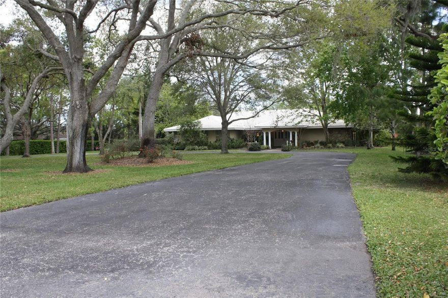This beautifully maintained luxury home offers a rare blend of comfort and equestrian living, just minutes from the stunning shores of Indian Rocks Beach. Featuring 5 spacious bedrooms, 3 full bathrooms, and a dedicated
office or library, this residence boasts an open floor plan with sweeping views of the oversized pool and a generous 2.5-acre yard. The updated kitchen comes equipped with high-end stainless steel KitchenAid appliances
and granite countertops. Enjoy year-round entertaining in the screened-in outdoor bar overlooking the expansive pool and spa. The interior laundry room includes washer and dryer for your convenience. Located on a quiet cul-de-sac backing up to Walsingham Park and the scenic equestrian trail, this home offers both privacy and easy access to nature. Pool and
lawn maintenance are included in the rent. This exceptional home truly has it all!