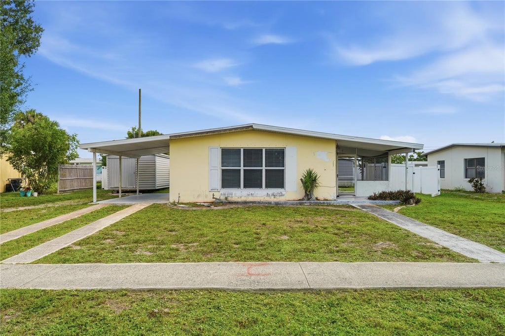 Photo of 21123 Glendale Avenue, Port Charlotte, FL 33952 (MLS # D6147733)