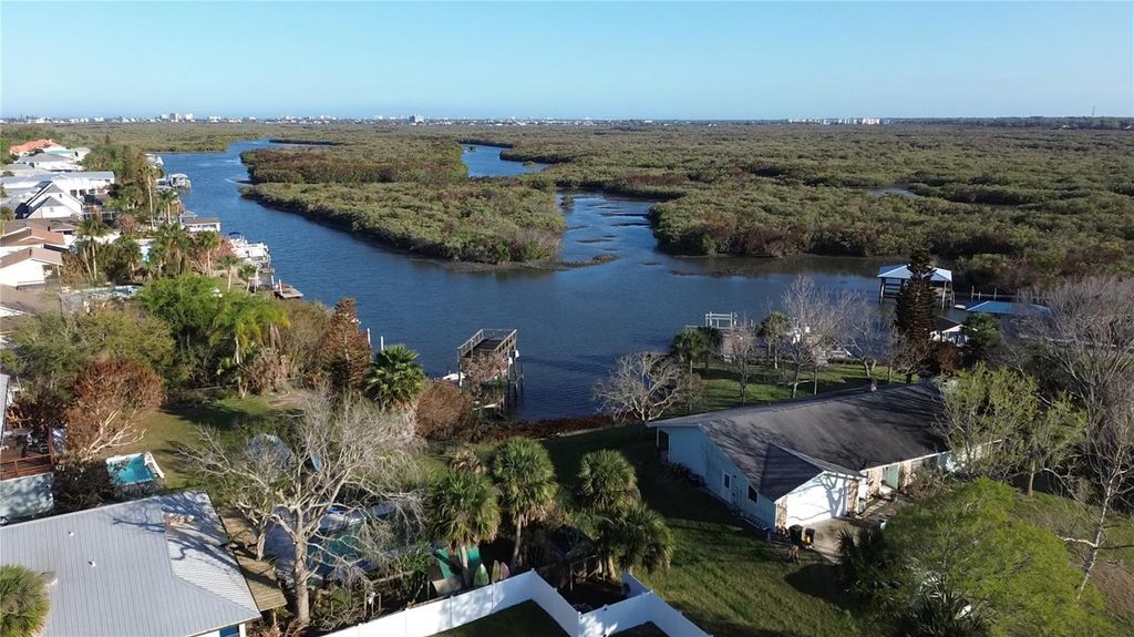 Photo of 1 Cunningham Drive, New Smyrna Beach, FL 32168 (MLS # NS1087594)