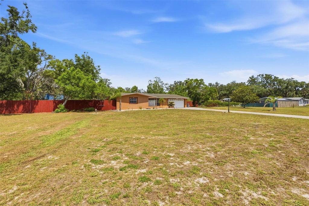 Photo of 10744 Osceola Drive, New Port Richey, FL 34654 (MLS # TB8521645)