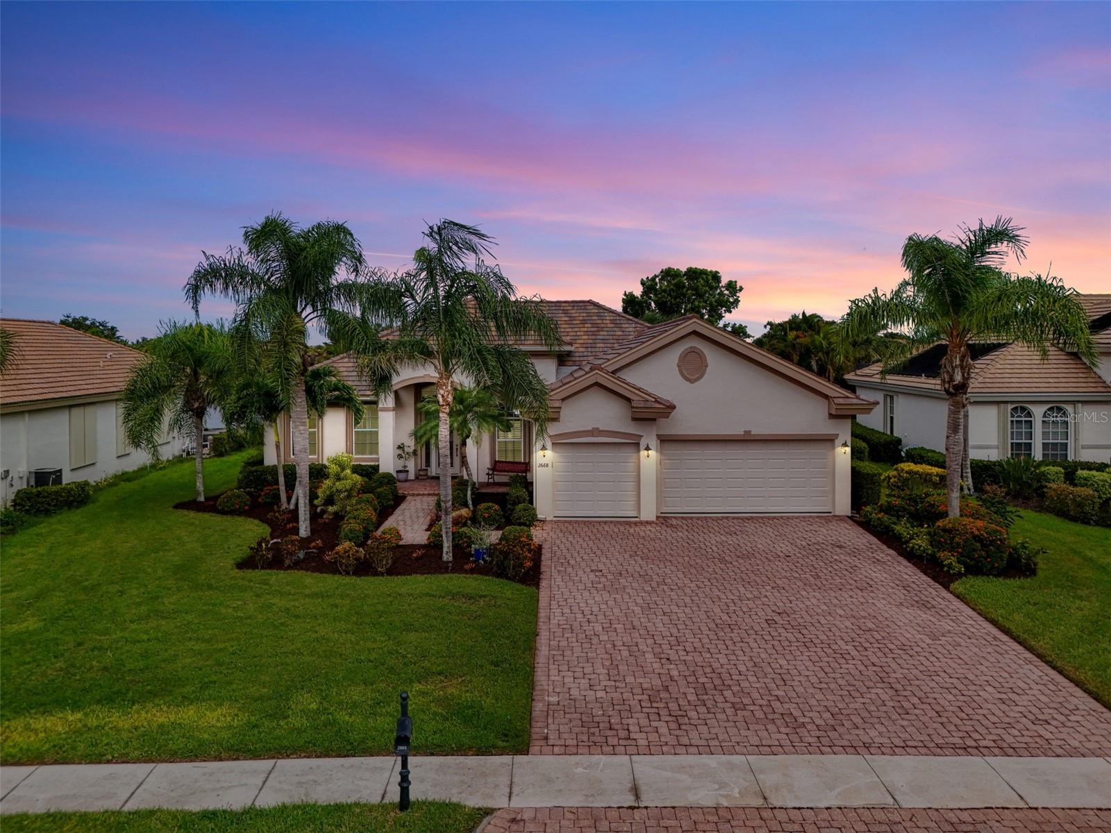 Indulge in a lifestyle where the beauty of nature meets the simplicity of living in the delightful community of Riverwood. A impeccably maintained popular Sussex floor plan home with expansive views of a peaceful pond with stunning Florida sunsets. With 3 bedrooms, 3 baths plus den and a 3 car garage, this spacious home is ideal. This well-appointed home features airy 12-foot ceilings, 8-foot interior doors, 20" ceramic tile flooring set on the diagonal in the living area and guest bedrooms. The renovated kitchen with 42" upper wood cabinets, granite countertops, crown molding, subway tile backsplash, stainless steel appliances and under cabinet LED lighting offers a clutter-free space to relax and entertain. A coffee nook/bar with upper and lower cabinets and wine fridge. The sliding glass doors lead you to a decorative concrete stamp finish lanai with an inviting salt water pool and spa. Pool and Spa resurfaced with Pebble Tec finish, waterline tile and NEW (2025) pool pump and pool heater (2023). Take in the beautiful unobstructed water view from the "Picture Window" pool enclosure. The primary suite, with access to the lanai, includes a walk in closet, tub and separate shower. A split floor plan provides privacy for you and your guests. Laundry room with utility sink, granite countertop and tile backsplash. ADDITIONAL FEATURES: NEW ROOF 2025, EXTERIOR PAINTED 2025, NEW POOL CAGE (2023), HURRICANE SHUTTERS, EPOXY GARAGE FLOOR AND MORE. SEE SPECIAL FEATURE SHEET! Don't let this extraordinary opportunity slip away. GOLF CLUB NAMED *TOP 50 US COURSES* *GOLF ADVISOR* *2018*, ACTIVITY CENTER CAMPUS INCLUDES LAP & RESORT STYLE POOL, FITNESS CENTER, PICKLE-BALL COURTS, SMALL AND LARGE DOG PARKS, TENNIS COURTS, LAWN CROQUET, BOCCE COURTS, CRAFT ROOM, LIBRARY AND SOCIAL ACTIVITIES! Additional fees apply for Riverwood Golf Club & Private Beach Club on Manasota Key. Riverwood is Close to Tampa Bay Rays Spring Training Facility, Atlanta Braves Spring Training Facility, Gulf Beaches, Carlotte Harbor, Myakka River, Punta Gorda, Englewood and Boca Grande. Riverwood, a Perfect Blend of Florida's Nature and Resort Lifestyle.