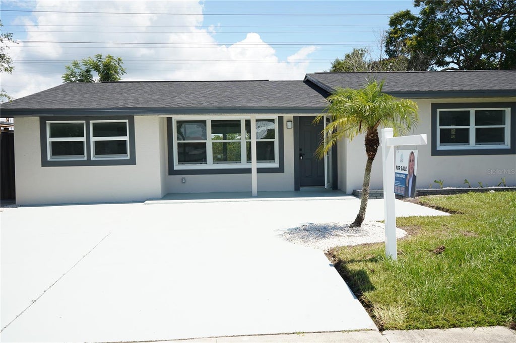Photo of 311 Country Club Drive, Oldsmar, FL 34677 (MLS # TB8548017)